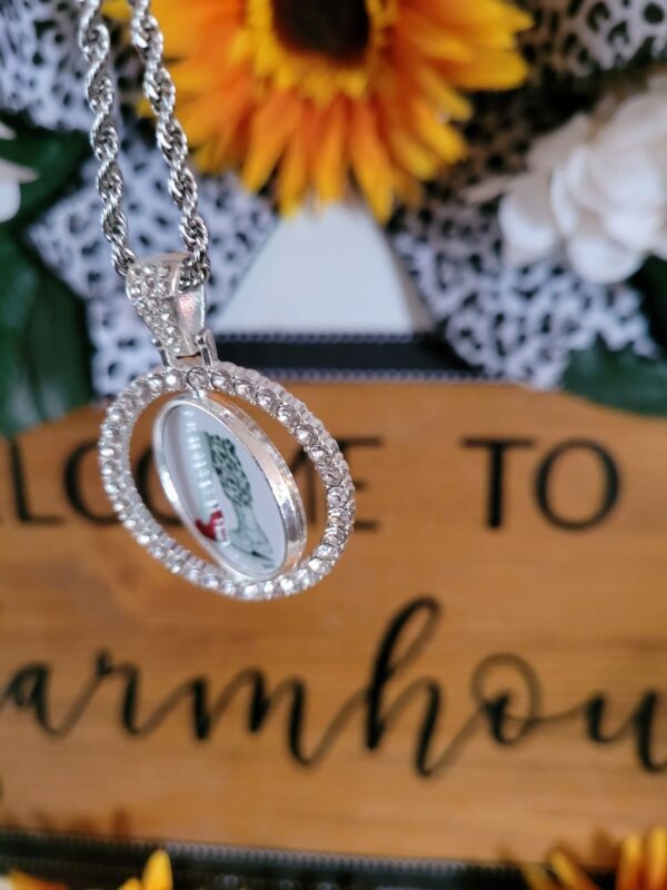 A close up of a necklace on a wooden table