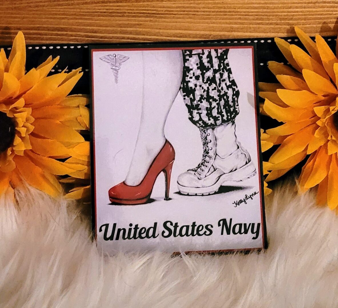 Illustration featuring a red high heel and a rugged boot with Kelly McCook Series Navy - Decal/Magnet text, surrounded by yellow flowers and white feathers.