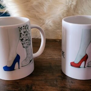 Two coffee cups with a picture of shoes on them.