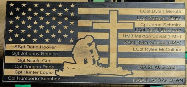 Custom Flags with engraved american flag, a soldier kneeling by a cross, and names of service members, labeled "kabul afghanistan kia 26 aug 2021.