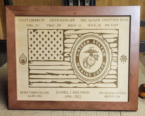Custom Flags with the u.s. flag, marine corps emblem, and text commemorating a service member's military affiliations and service dates.