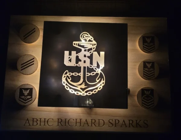 Custom Engraved Mirrors with a u.s. navy anchor symbol, surrounded by military rank insignias and labeled "abhc richard sparks.