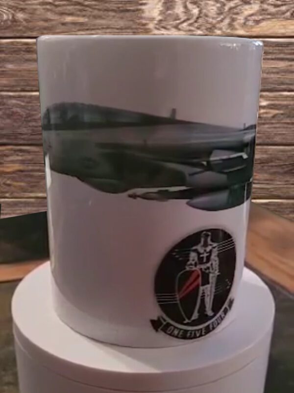 A cup with an image of a fighter jet on it.