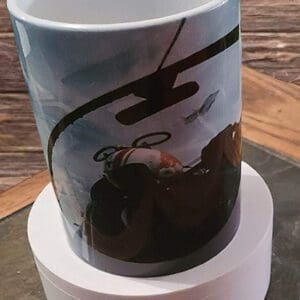 A coffee mug sitting on top of a wooden table.