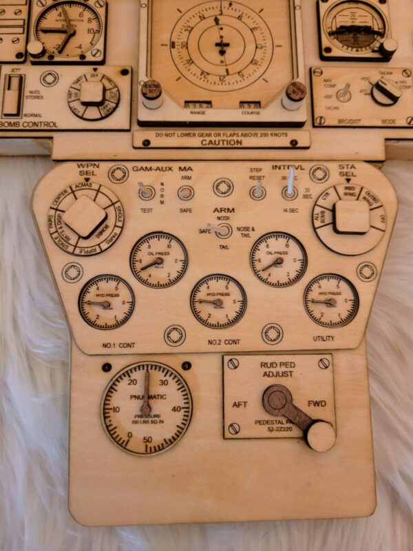 A wooden airplane control panel with many different controls.